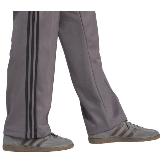 Adidas Ανδρικό παντελόνι φόρμας Adicolor Baggy-Fit Firebird Track Pants